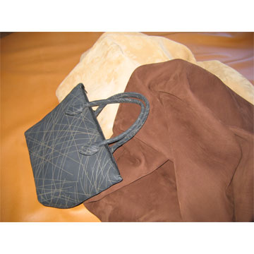 Sac en Taurillon Nubuck travaillé au laser